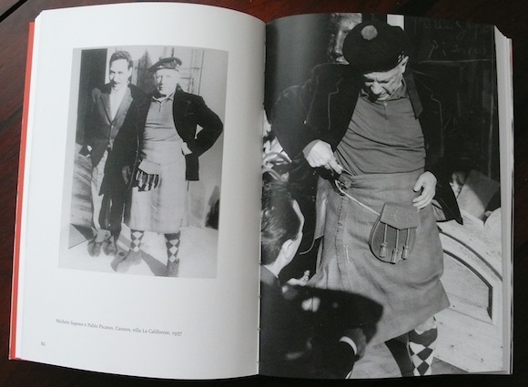 Fitting for bespoke kilt, velvet jacket and checked stockings, 1957