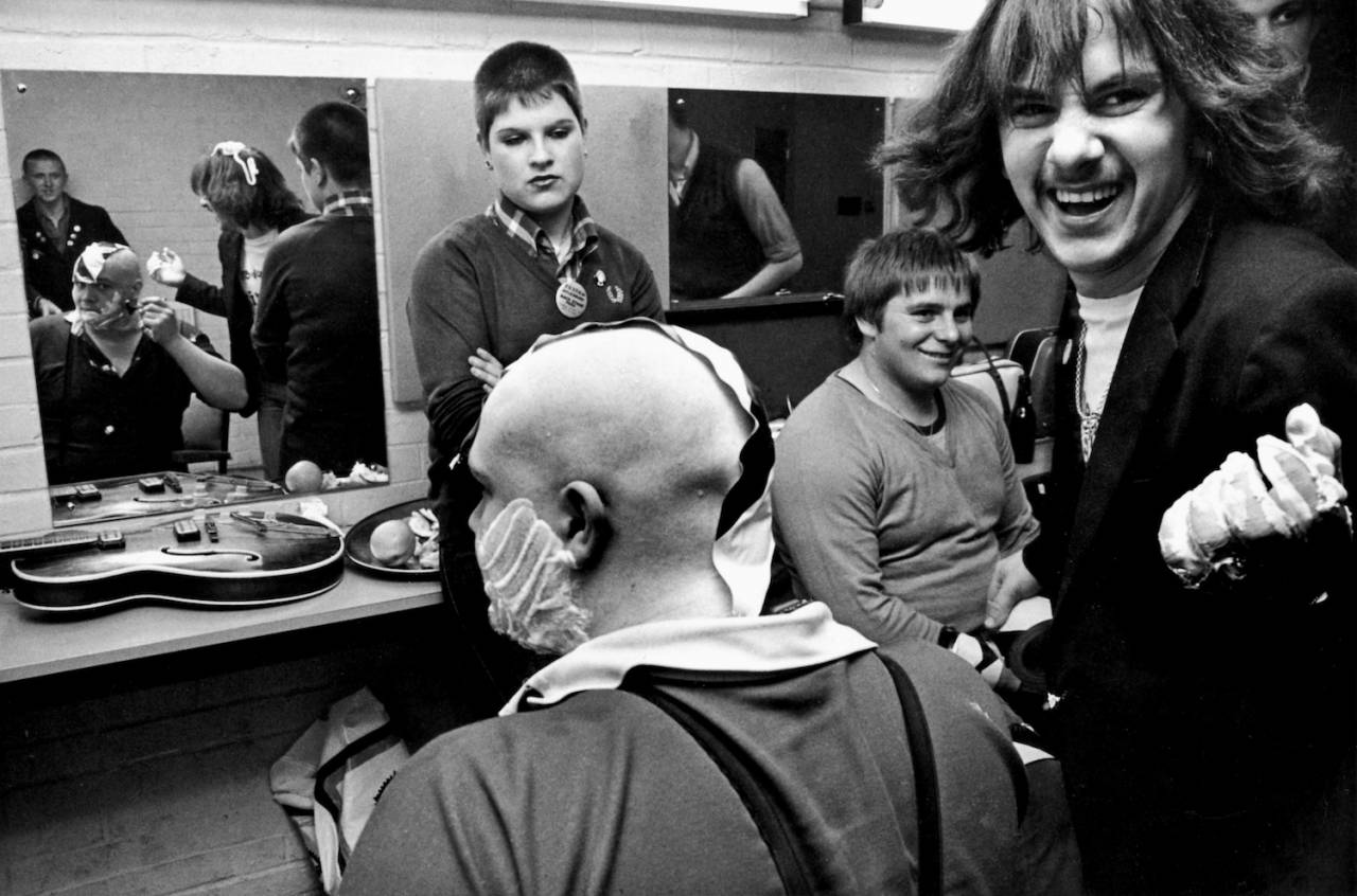Buster Bloodvessel of Ska, 2 Tone band, Bad Manners, having his head shaved backstage, UK 1980