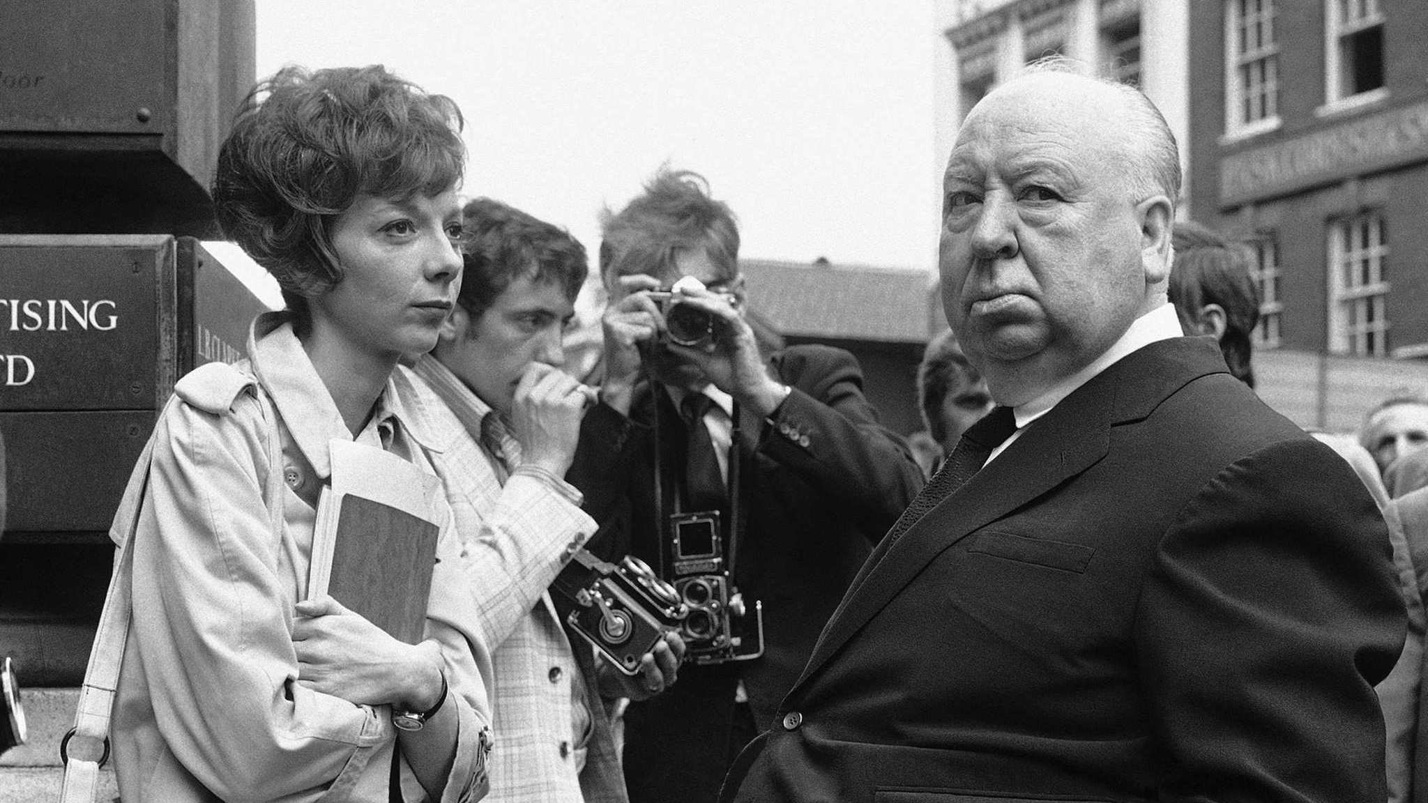 July 26, 1971, photo, Alfred Hitchcock, right, discusses