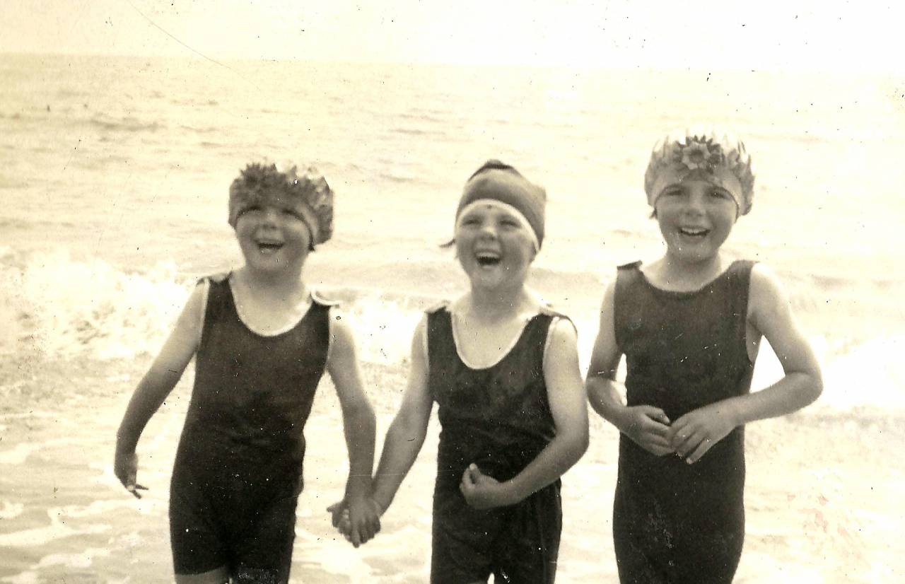 The girls on a visit to the beach in Lowestoft, Suffolk, in July 1928.