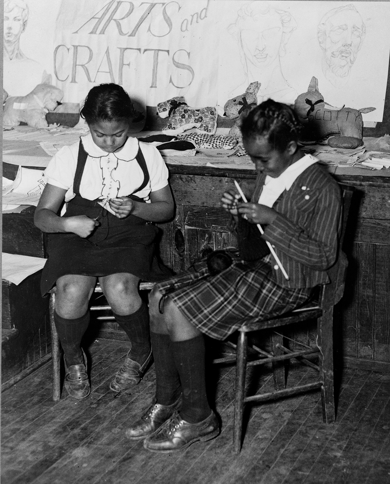 Girls engaged in knitting and making toy animals in the handicraft class of the St. Simon’s Youth Center of the National Youth Administration, Philadelphia, Pennsylvania, 1941.