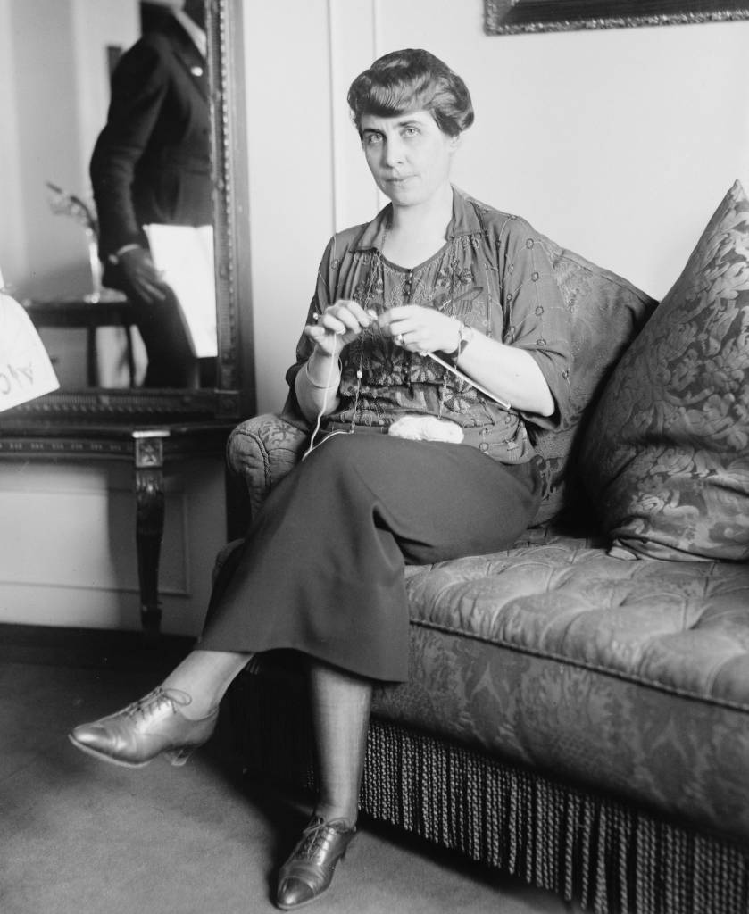 1921 portrait of Grave Coolidge (1979-1947), wife of then Vice President Calvin Coolidge knitting.