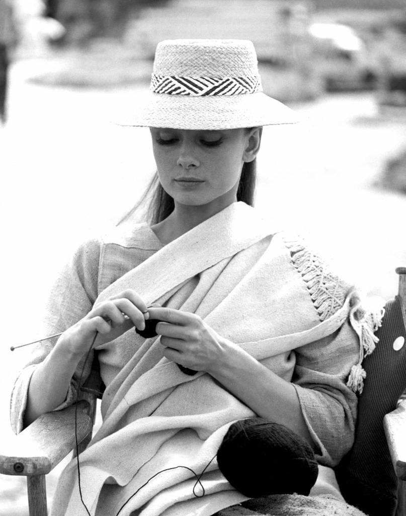 Audrey Hepburn knitting while waiting on location for THE NUN'S STORY - 1959