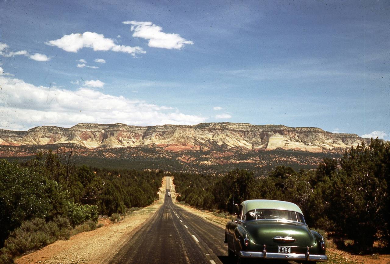 My father's '51 Chevy Bel Aire. His girlfriend is looking out of the window. They are looking towards The Sentinel from Zion Park Blvd.