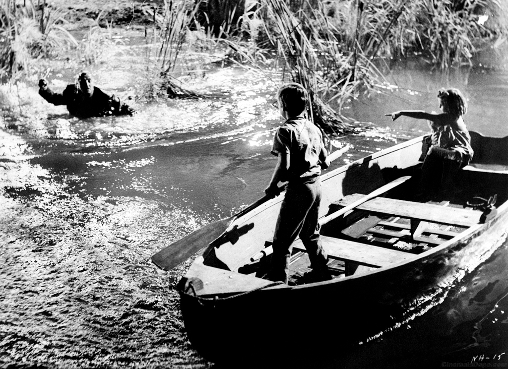 Robert Mitchum, Billy Chapin and Sally Jane Bruce in The Night of the hunter