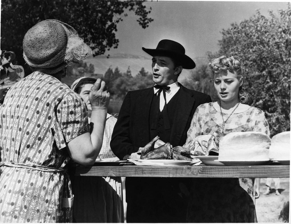 Robert Mitchum and Shelley Winters in The Night of the hunter directed by Charles Laughton, 1955