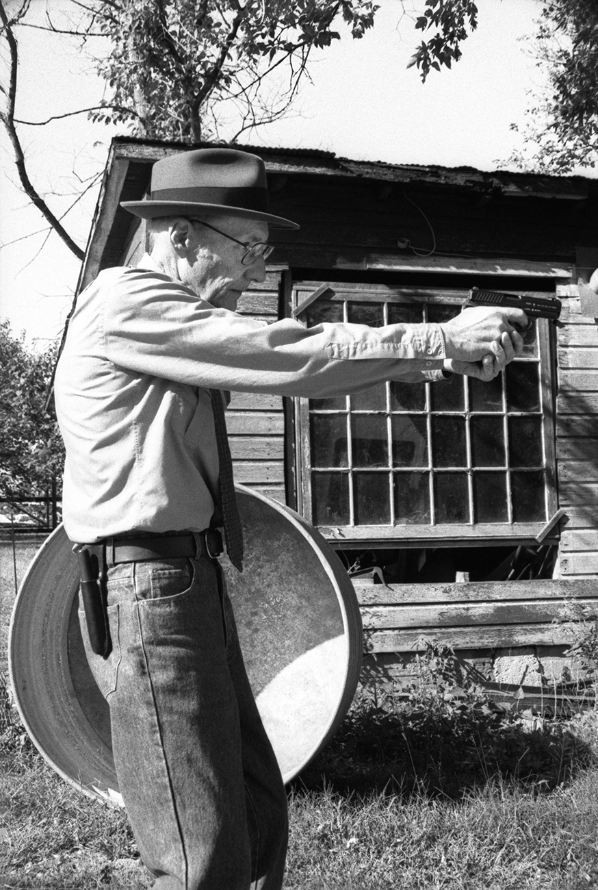 William Burroughs during target practice. Lawrence Kansas