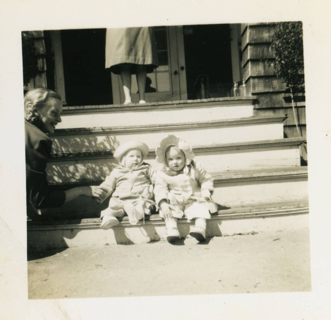 I think this is me (left) with my contemporary cousin Diane Polhemus with my mother (Margaret 'Peggy' Polhemus to the left and my father's mother, Nancy Polhemus above - 1205 9th Ave, Neptune City, New Jersey, USA - notes written by my mother on other, larger photos of this situation show this to be Easter, 1948.