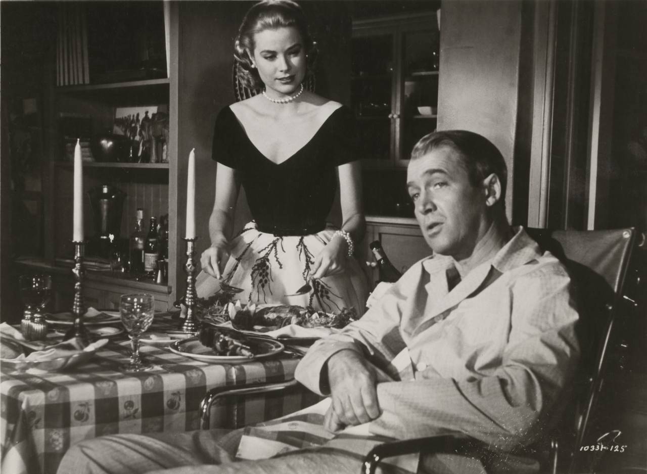 Grace Kelly and James Stewart in Rear window directed by Alfred Hitchcock, 1954