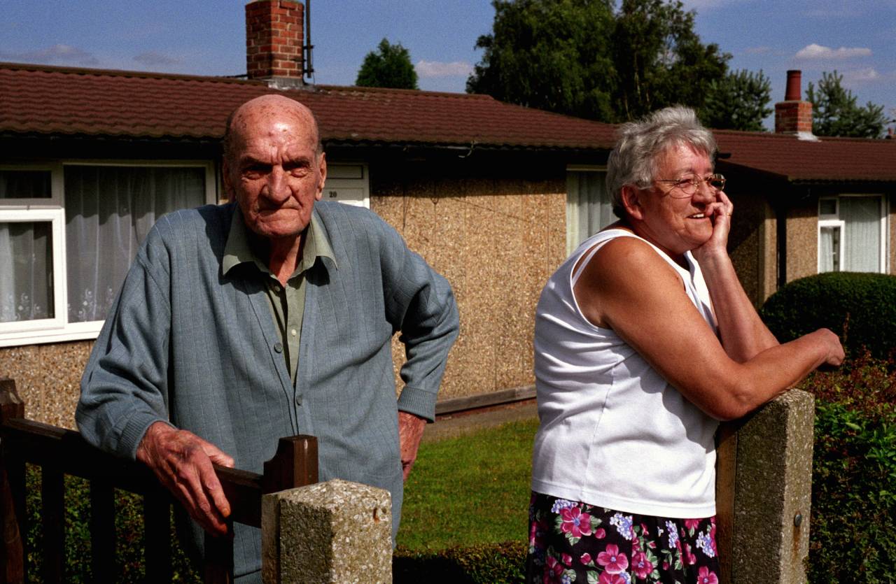 When I met both Jean and Ronald in Chesterfield, I was very touched by the love they still shared for each other after being married for almost 60 years. There was something very moving about them although Ronald looks a bit grumpy on this photo. He was a miner as most of the men from his generation who live in prefabs. He had a bad cough when I met him in 2005 but he was still smoking occasionally. His 60s ashtray always stood near his armchair. Seven years later, Jean is sitting in it, the ashtray has gone, so has Ronald. Jean has hung a black and white photo of 'her Ron' - as she calls him - when he was a kid and a recent one in colour just above his old armchair. Jean sounds sad when she talks about him but she can also be very smiley and she shows us where she now usually sits, by the window, 'so I can have the view on everything what's going on on the street!', she she admits, with a big cheeky smile.