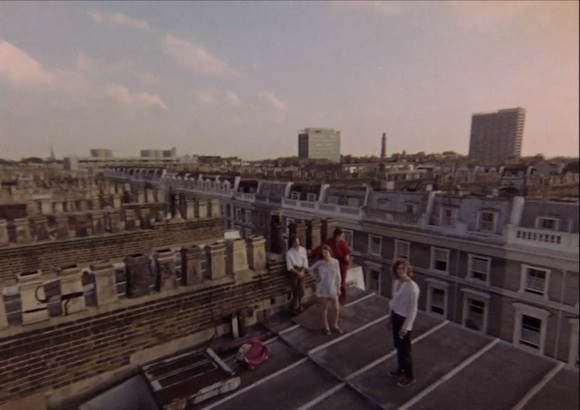 Group overlooking the roofs of Notting Hill at sunset