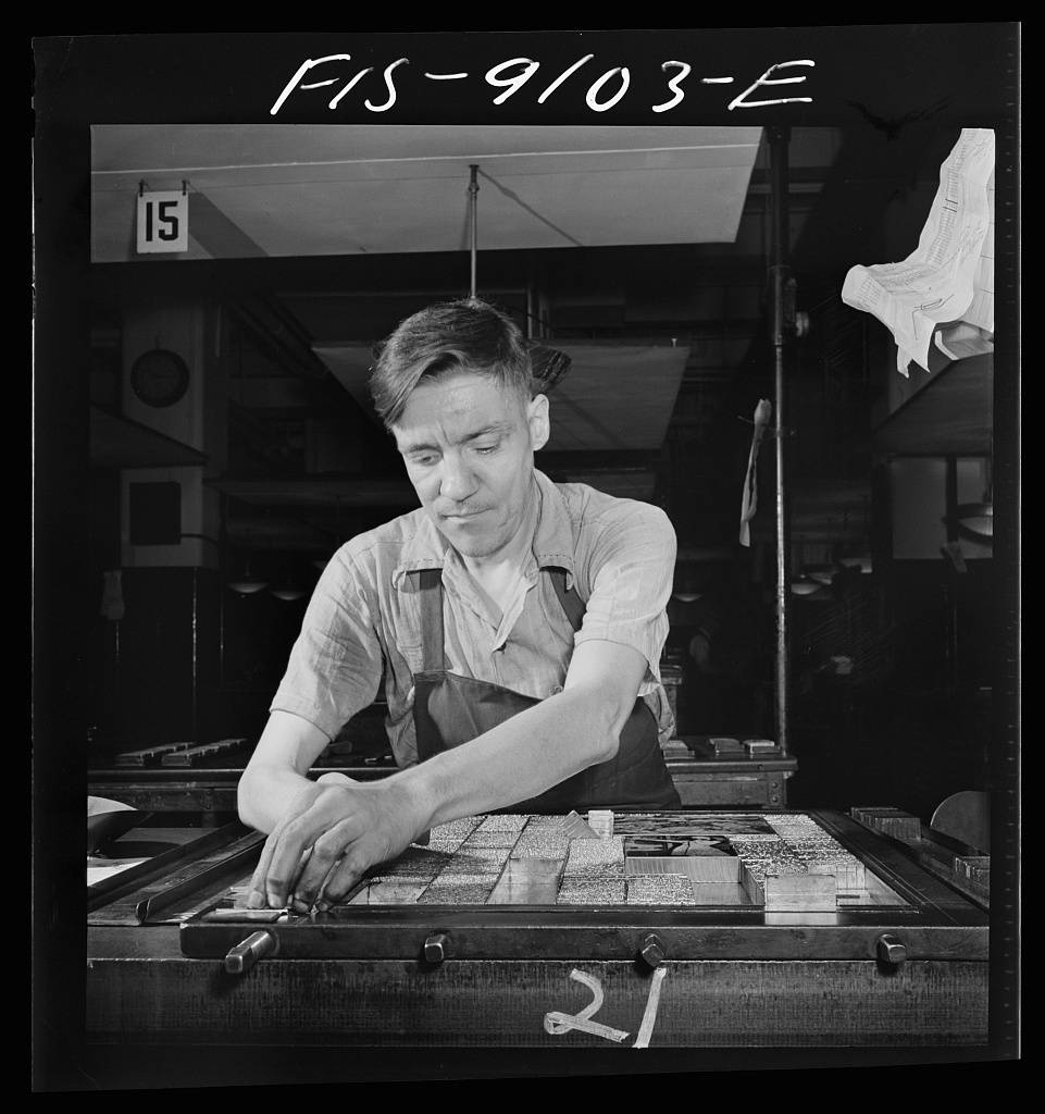 Composing room of the New York Times newspaper. Making up the sports page