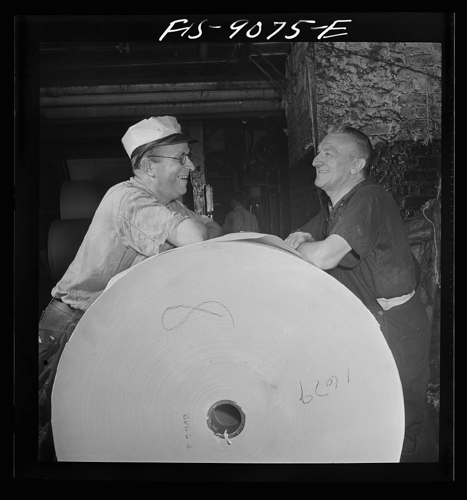 Reel room of the New York Times newspaper. Pressman resting between editions