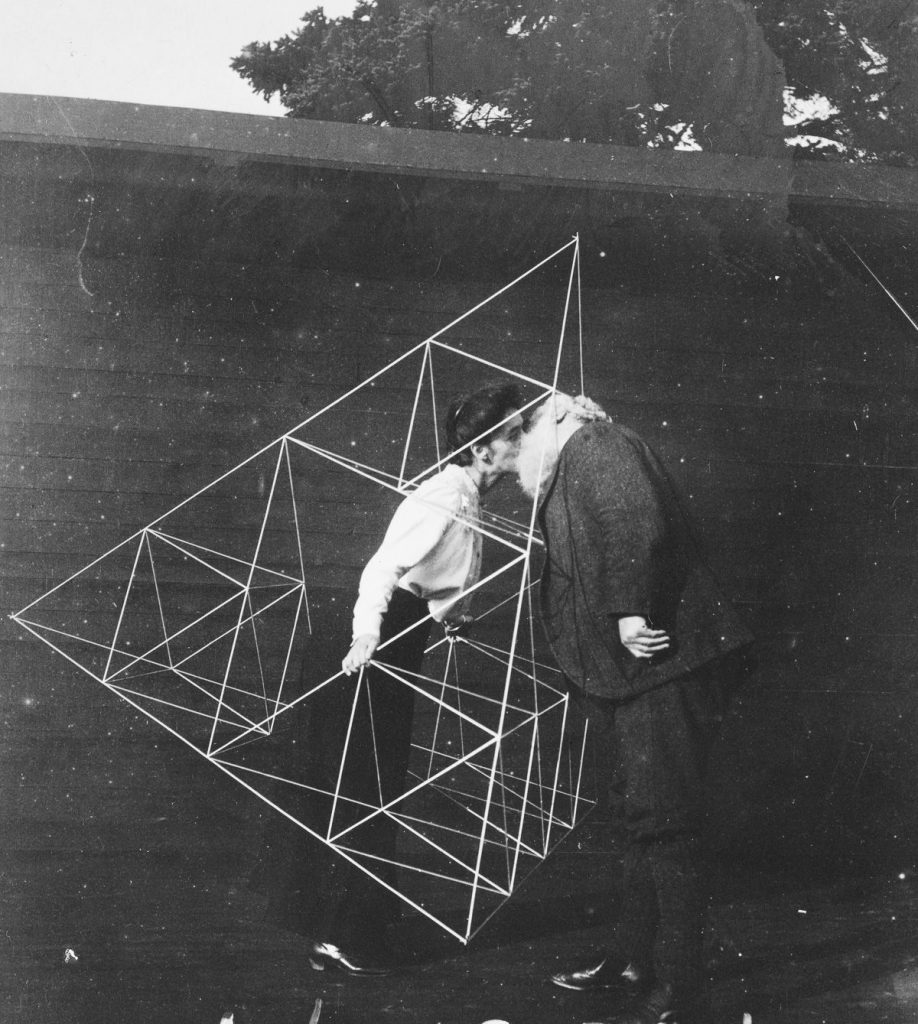 Oct. 16, 1903 Alexander Graham Bell kisses his wife Mabel Hubbard Gardiner Bell inside a tetrahedral framework.