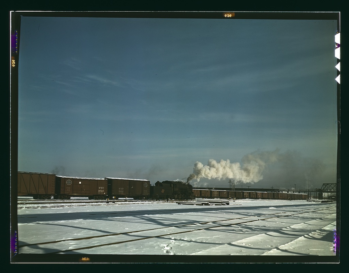 A train pulling out of the freight house at C & NW RR's Proviso(?) yard, Chicago, Ill. 1 transparency : color. Contributor: Delano, Jack Date: 1939