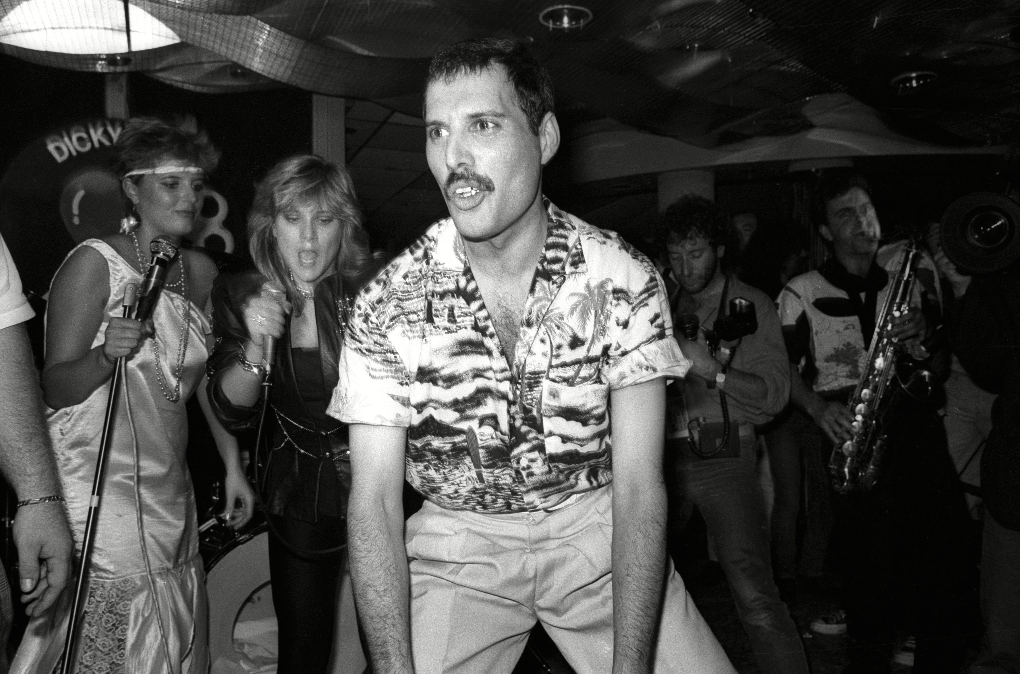Sam Fox in the Background Queen Hold A Private Concert and Party and Were Billed As 'Dicky Heart and the Pacemakers' at the Kensington Roof Gardens - 11 Jul 1986