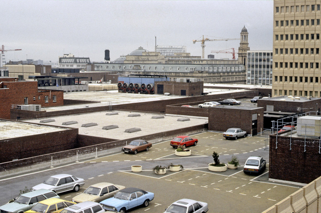 Roof of the Manchester Arndale Centre looking south west from Cannon Street to Market Street, with the Royal Exchange beyond. Photographed in May 1985.