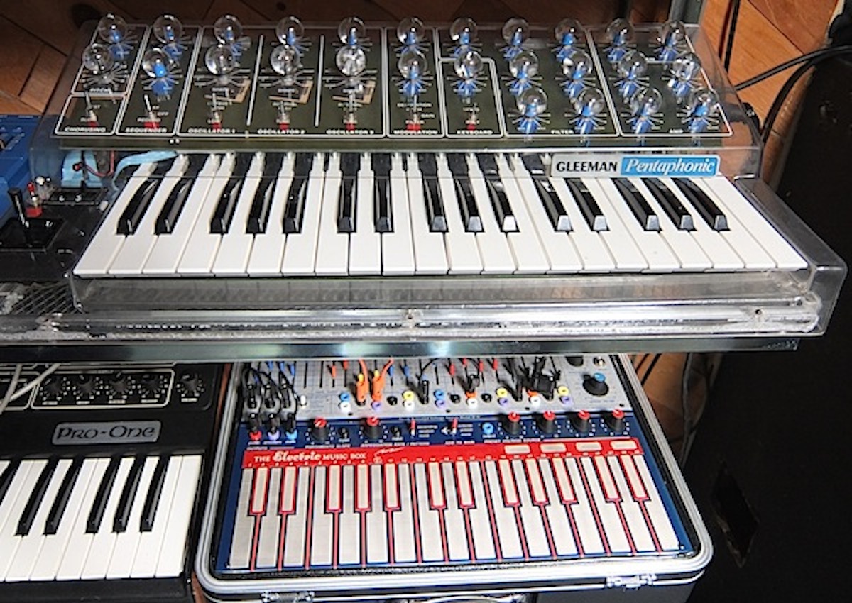 One of the gems of the Vintage Synthesizer Museum is a rare, clear, Gleeman Pentaphonic. Below that is a recent reissue of an Electric Music Box, often called a Music Easel, manufactured by Buchla. The Sequential Pro-One to the left is also fairly common.