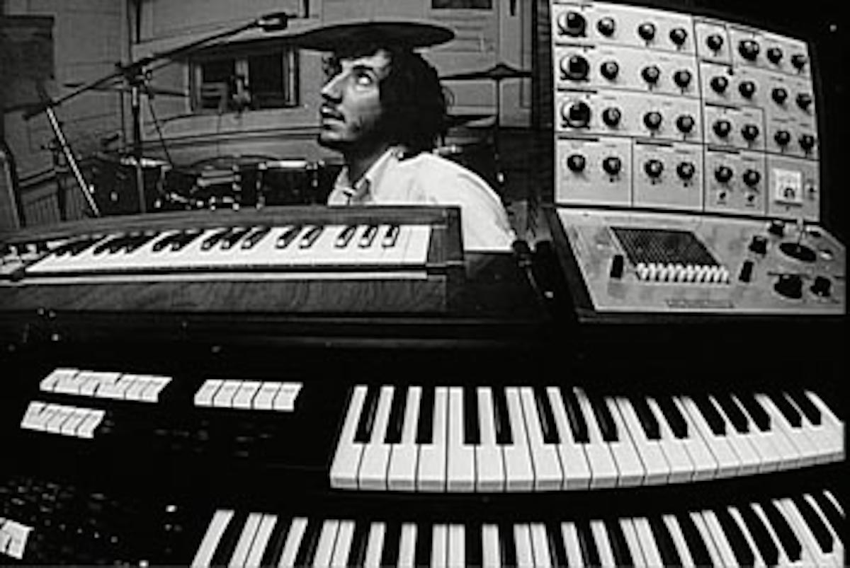 Pete Townshend in his home studio, with an EMS VCS 3 (at right) sitting atop his Lowrey organ.
