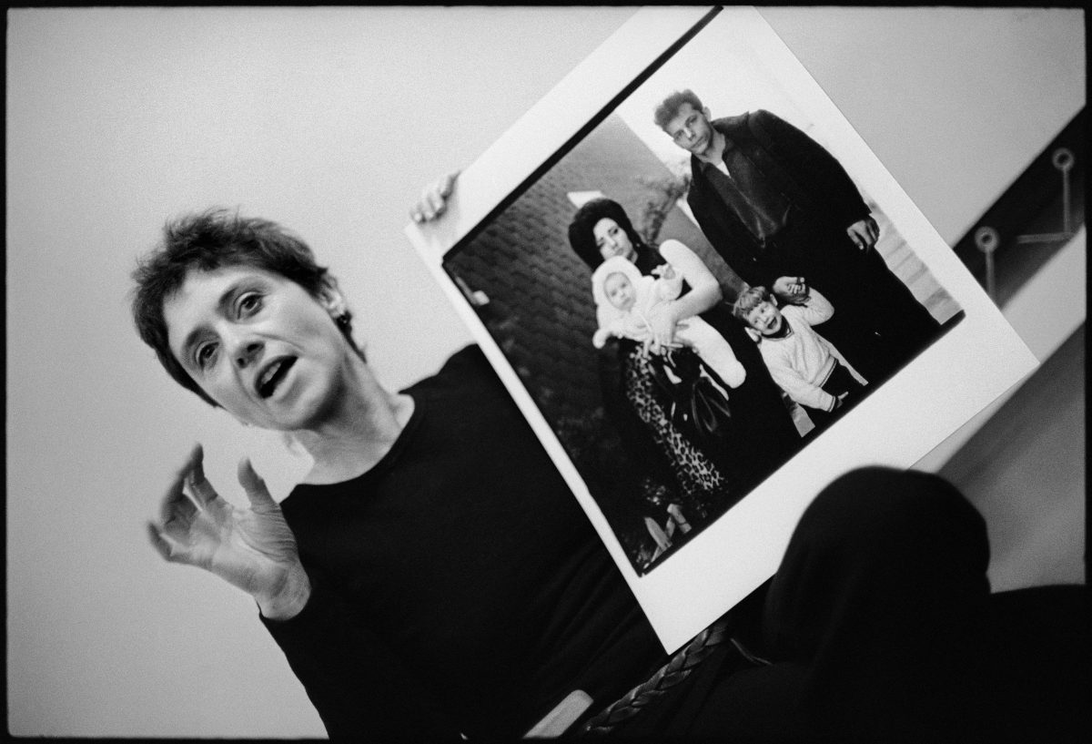 Stephen Frank, Diane Arbus with her photograph A young Brooklyn family going for a Sunday outing, N.Y.C. 1966, during a lecture at the Rhode Island School of Design in 1970