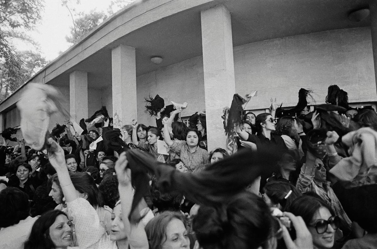 A group of women protesting against wearing the Islamic veil, while waving their veils in the air outside the office of the prime minister in Tehran, Iran, in March 1979.
