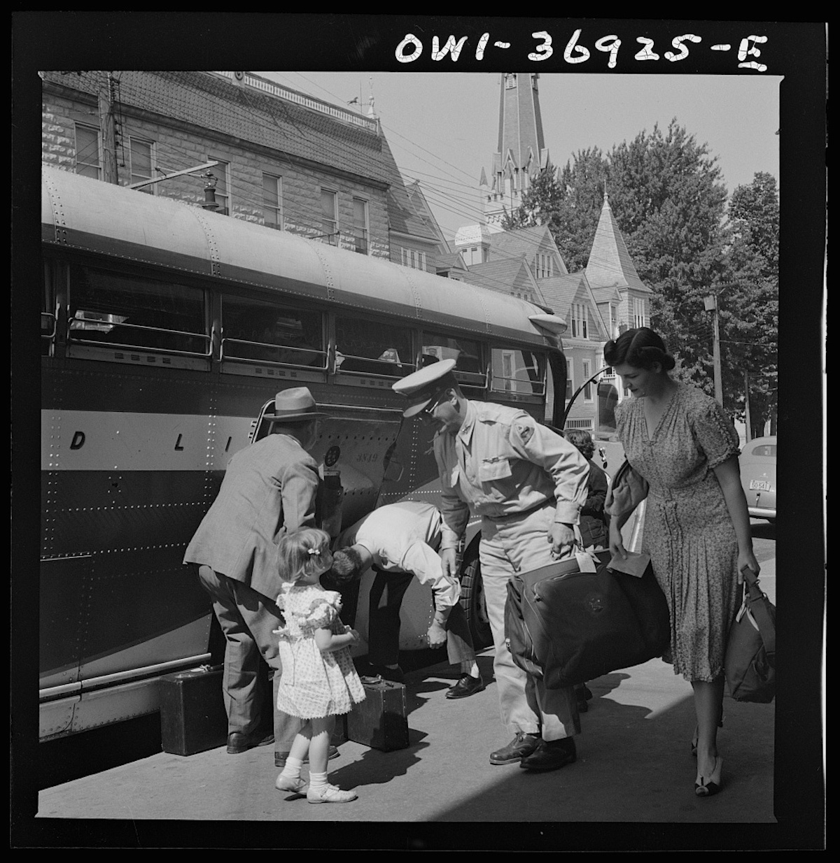 Passengers leaving a Greyhound bus in a small town in Pennsylvania