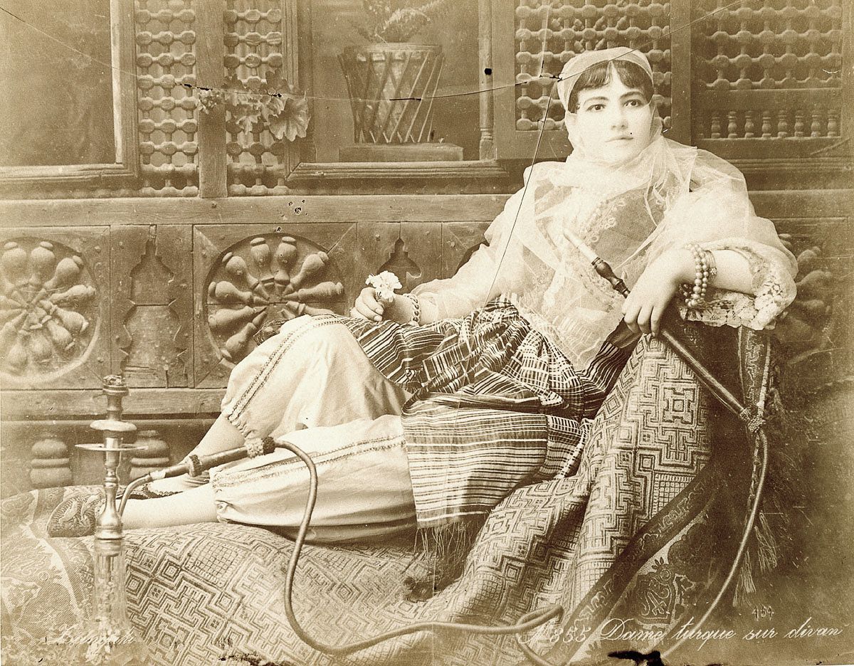 Turkish woman on couch.