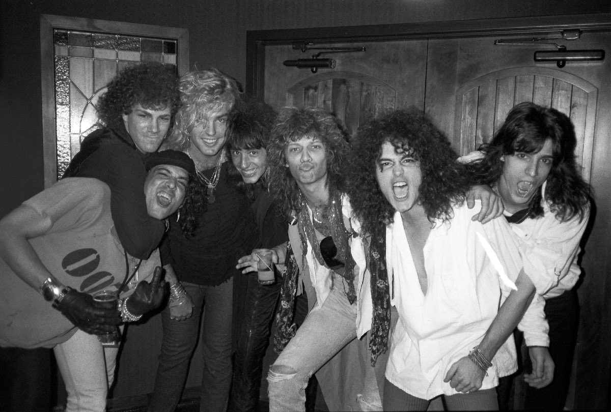 Ratt and Bon Jovi, (L-R Stephen Pearcy, David Bryan, Robbin Crosby, Richie Sambora, Jon Bon Jovi, Juan Croucier, Warren DeMartini), 1985.