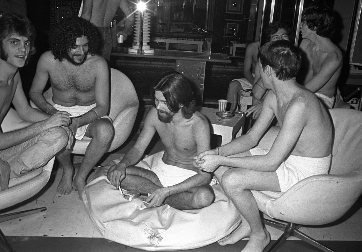Men in towels sitting at the Continental Club bath house in New York - Feb 4 1972
