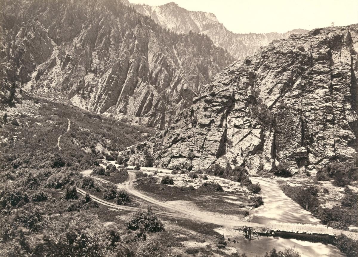 Big Cottonwood Canyon, Utah, in 1869. Note man and horse near the bridge at bottom right.