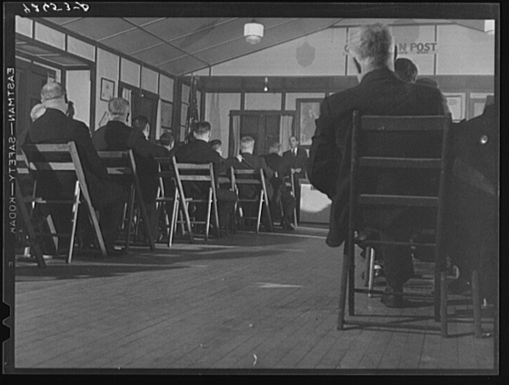 Union Meeting of the Fore River shipyard workers in Quincy, Massachusetts (IUMSWA-Industrial Union of Marine and Shipbuilding Workers of America). Defense housing was discussed Dec 1940