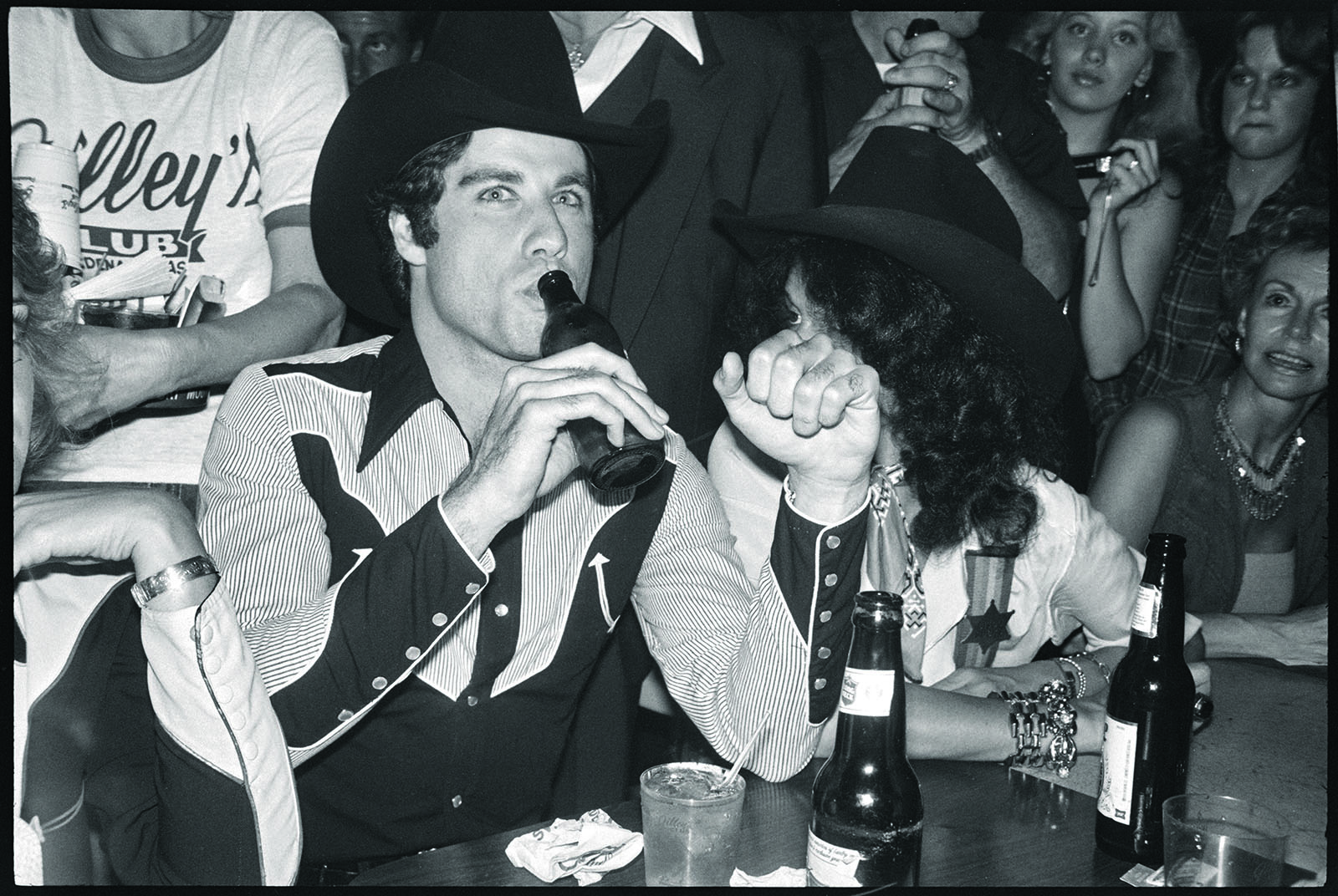 Andy Warhol (U.S.A., 1928–1987), Negative [Houston: John Travolta at the Urban Cowboy premier party at Gilley's], 1980, Black-and-white negatives. Cantor Arts Center collection, Gift of The Andy Warhol Foundation for the Visual Arts, 2014.41.2953_15. © The Andy Warhol Foundation for the Visual Arts, Inc.