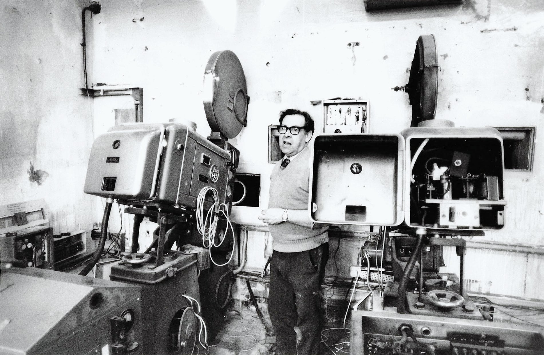 Billy Bell, technician installing projection equipment at Scala King’s Cross, 1981 Photograph- David Babsky