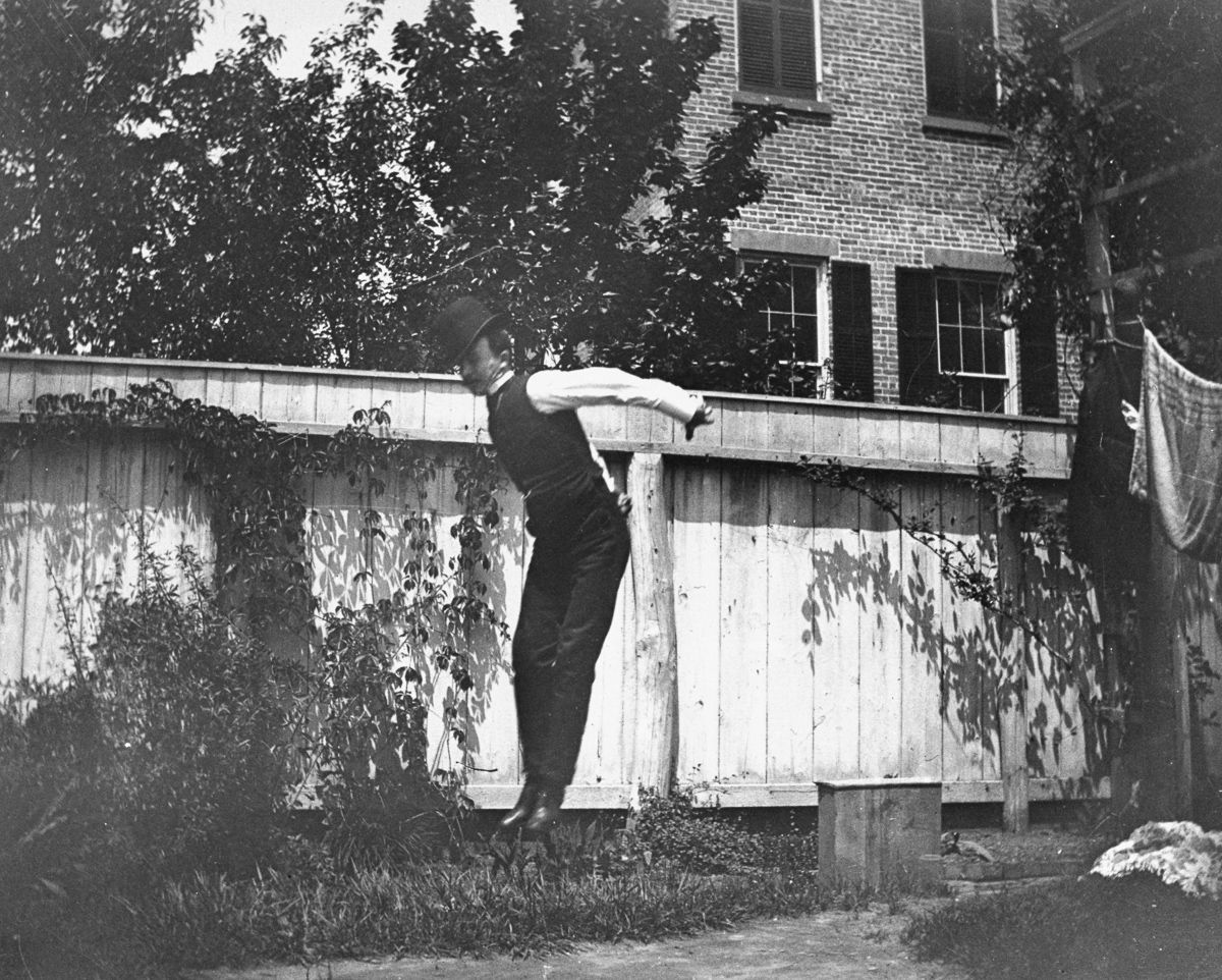 May 28, 1886 J.M. Cornell jumps in the backyard at 314 Livingston Street.