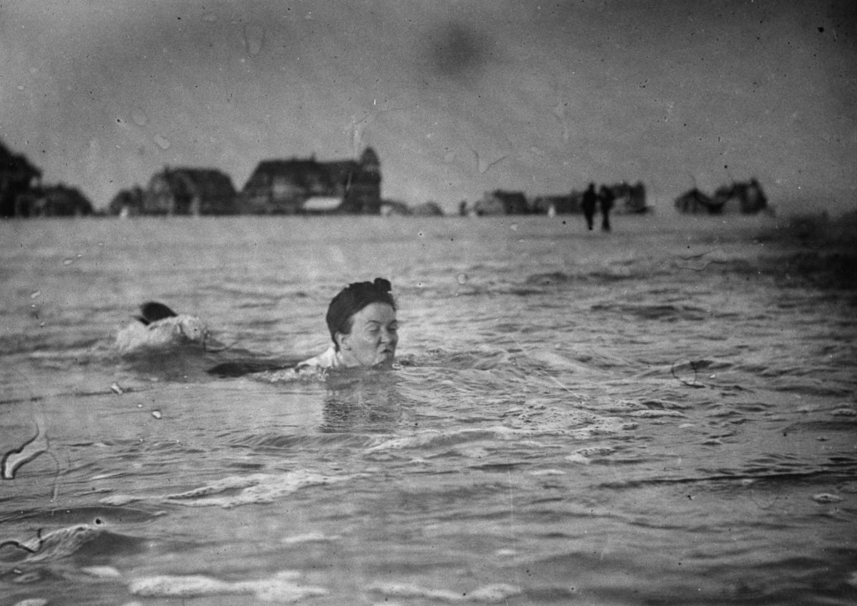 Sept. 8, 1897 A woman swims at the beach.