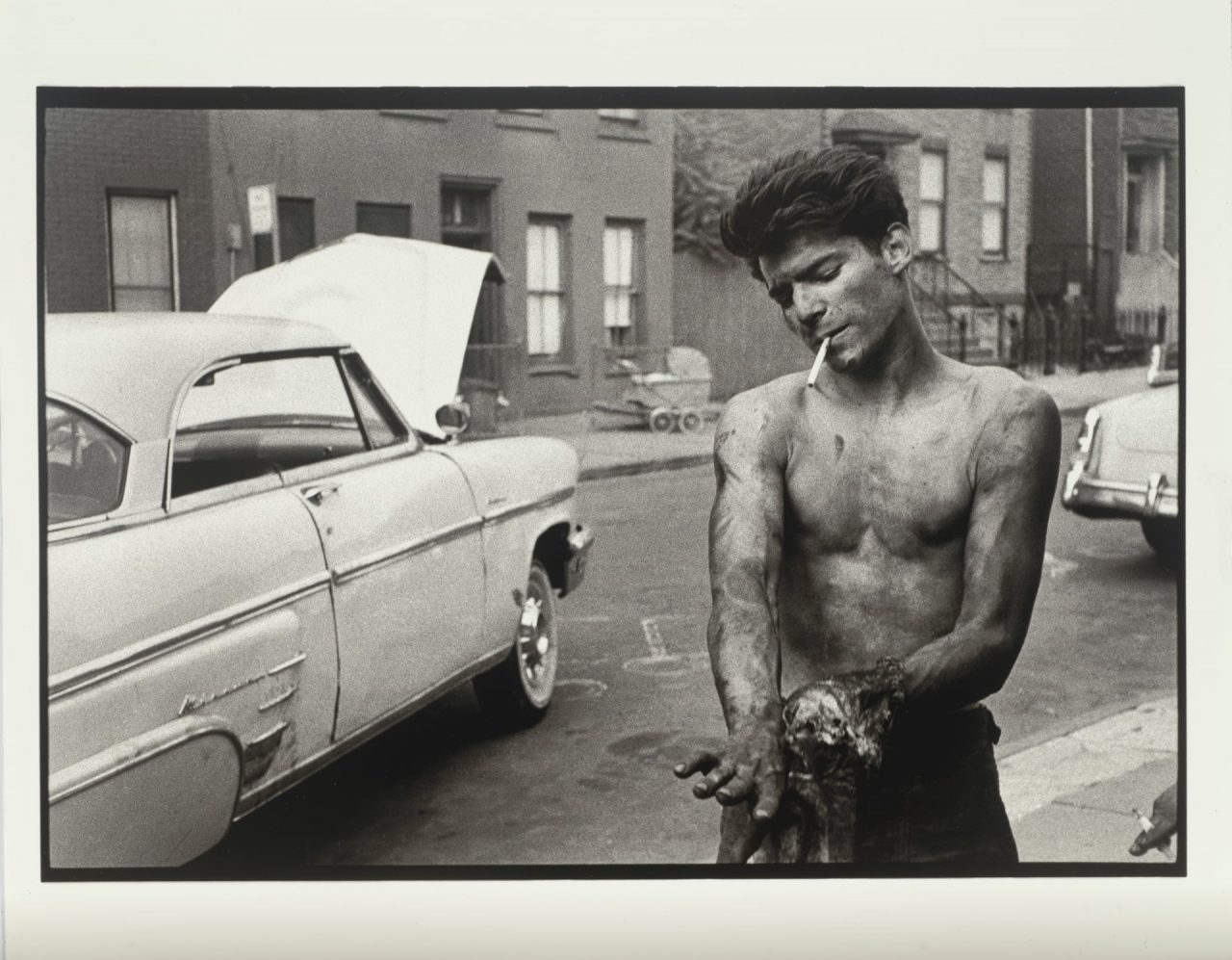 A boy works on his car, from the Brooklyn Gang series, 1959 - Flashbak