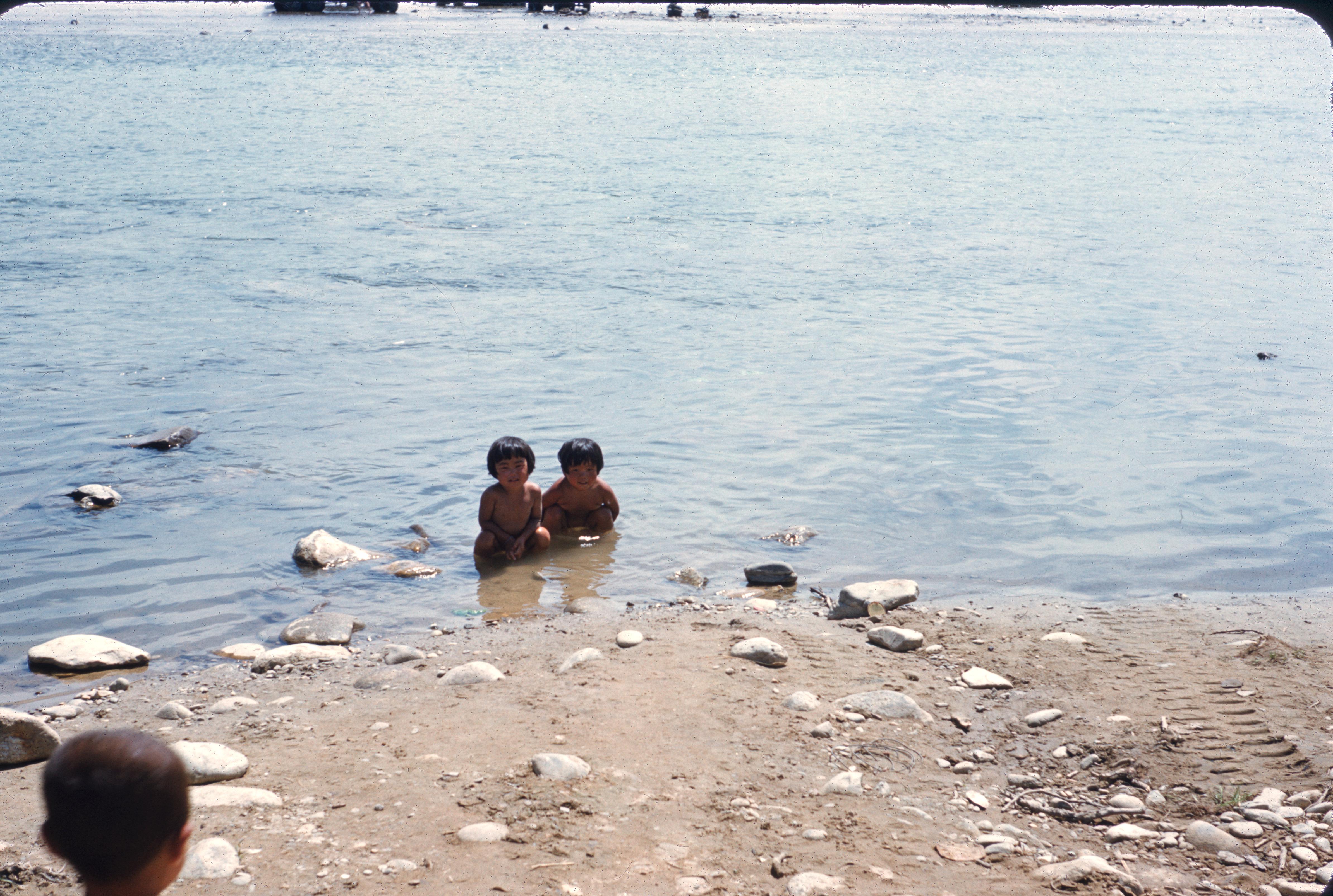 Children in Yanggu river, 1954