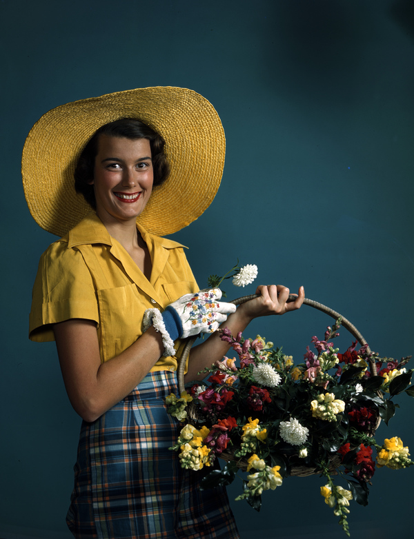 Model with a basket of flowers: Sarasota, Florida Local call number: JJS0093 Title: Model with a basket of flowers: Sarasota, Florida Date: ca. 1945