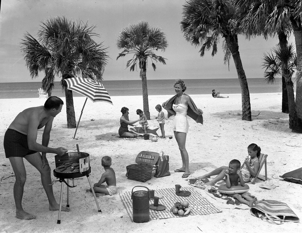 Swain family picnicking near the Colony Beach Club: Longboat Key, Florida Local call number: JJS0279 Title: Swain family picnicking near the Colony Beach Club: Longboat Key, Florida Date: 1958