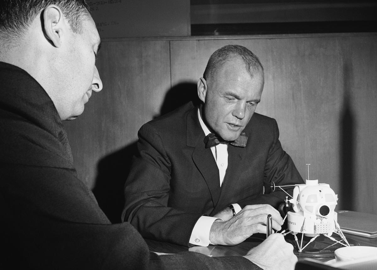 Astronaut John Glenn, Jr., talks with AP Correspondent Howard Benedict on anniversary of his space flight on February 8, 1963.