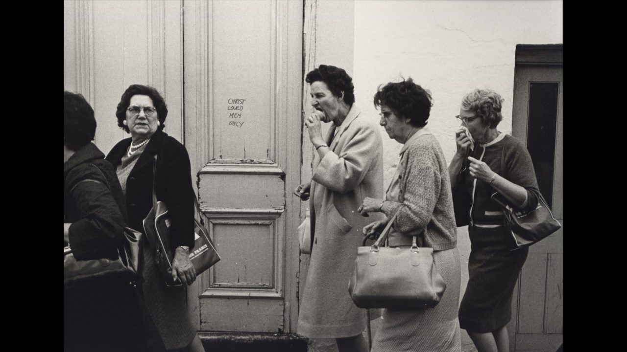 This door in London read "Christ loved men only" in 1967. Jill Freedman/Steven Kasher Gallery