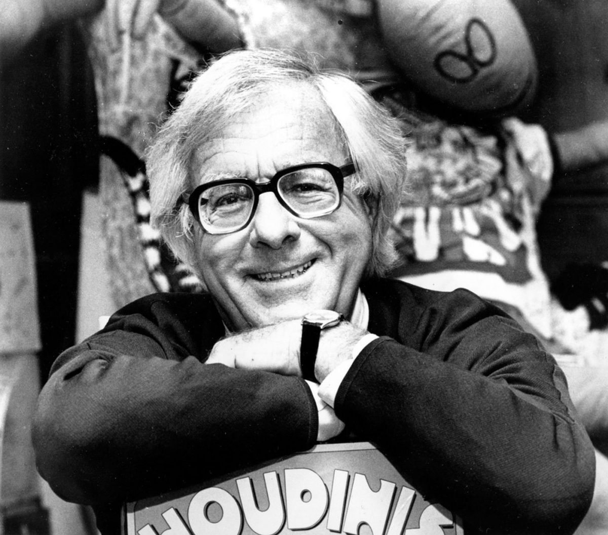 Science fiction writer Ray Bradbury smiles in his Beverly Hills, Ca., office in Feb. 1982. (AP Photo/Lennox McLendon)