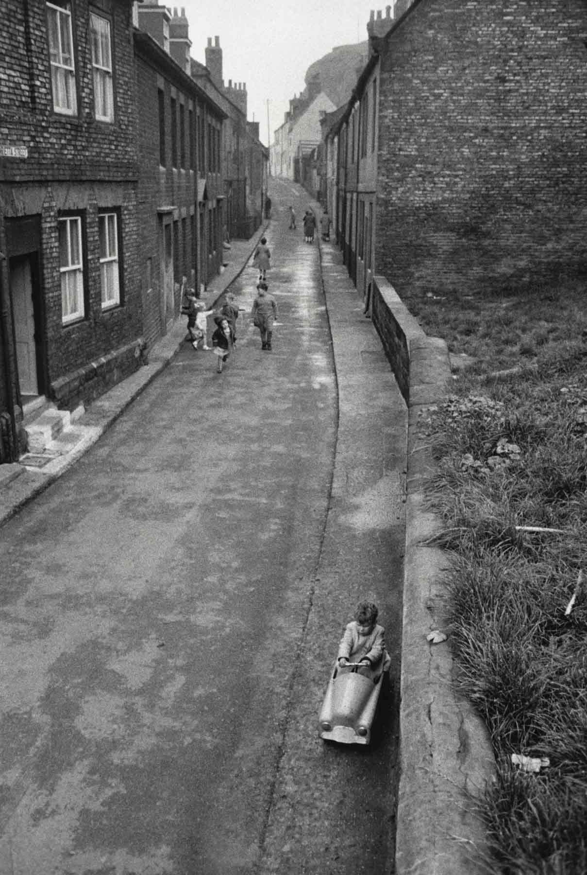 Child Riding in Toy Car, England, 1960 Bruce Davidson