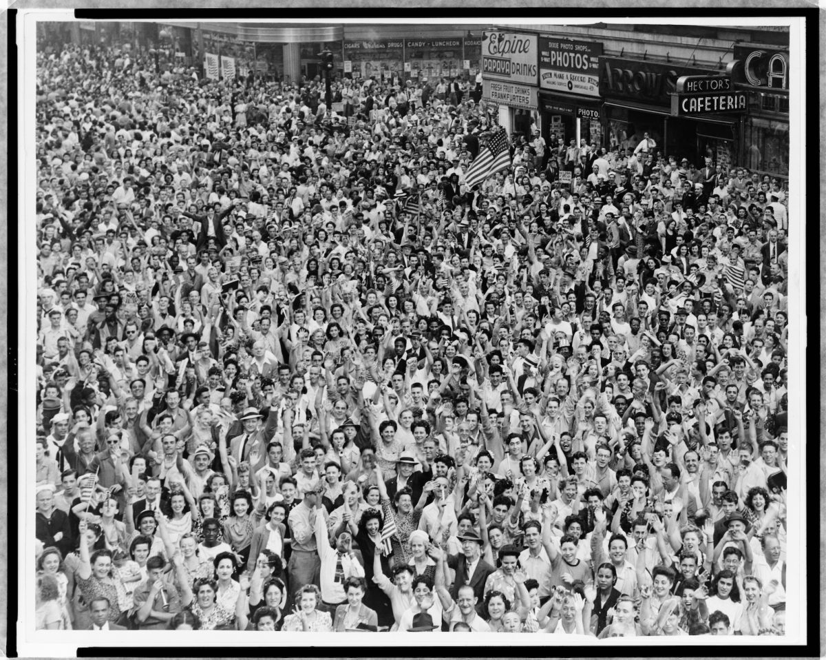 Title: [Crowd of people, many waving, in Times Square on V-J Day at time of announcement of the Japanese surrender in 1945] / World-Telegram photo by Dick DeMarsico. Creator(s): DeMarsico, Dick, photographer Date Created/Published: 1945 August 14.
