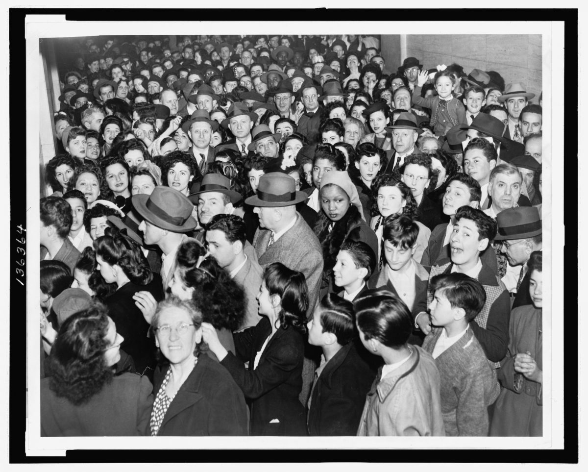 Title: They all want to stay well / World Telegram & Sun photo by Al Ravenna. Creator(s): Ravenna, Al, photographer Date Created/Published: 1947. Medium: 1 photographic print. Summary: Photograph shows crowd of people waiting to be vaccinated at the Department of Health building, New York City.