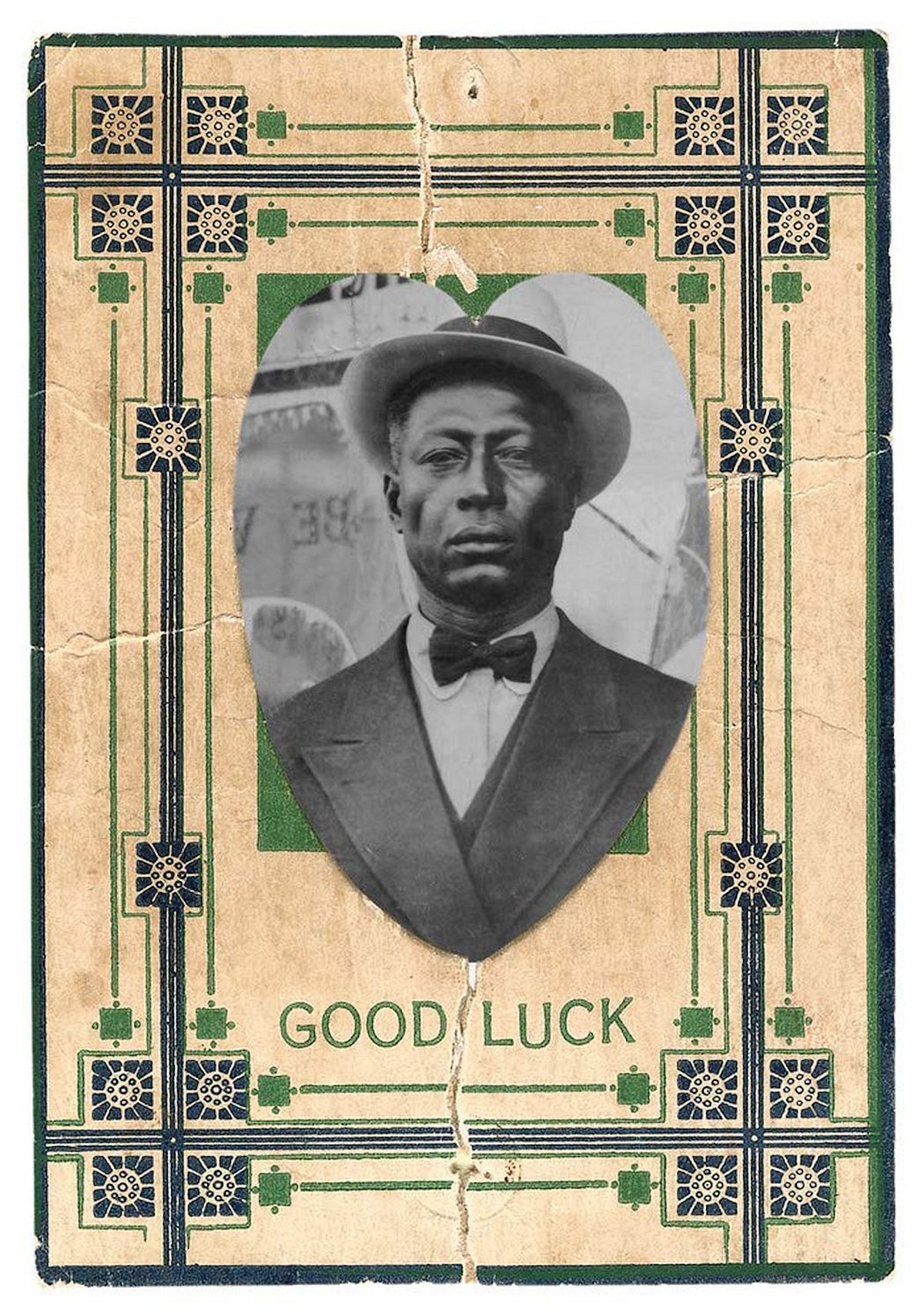 Portrait of Lead Belly on a playing card with the caption "Good Luck"