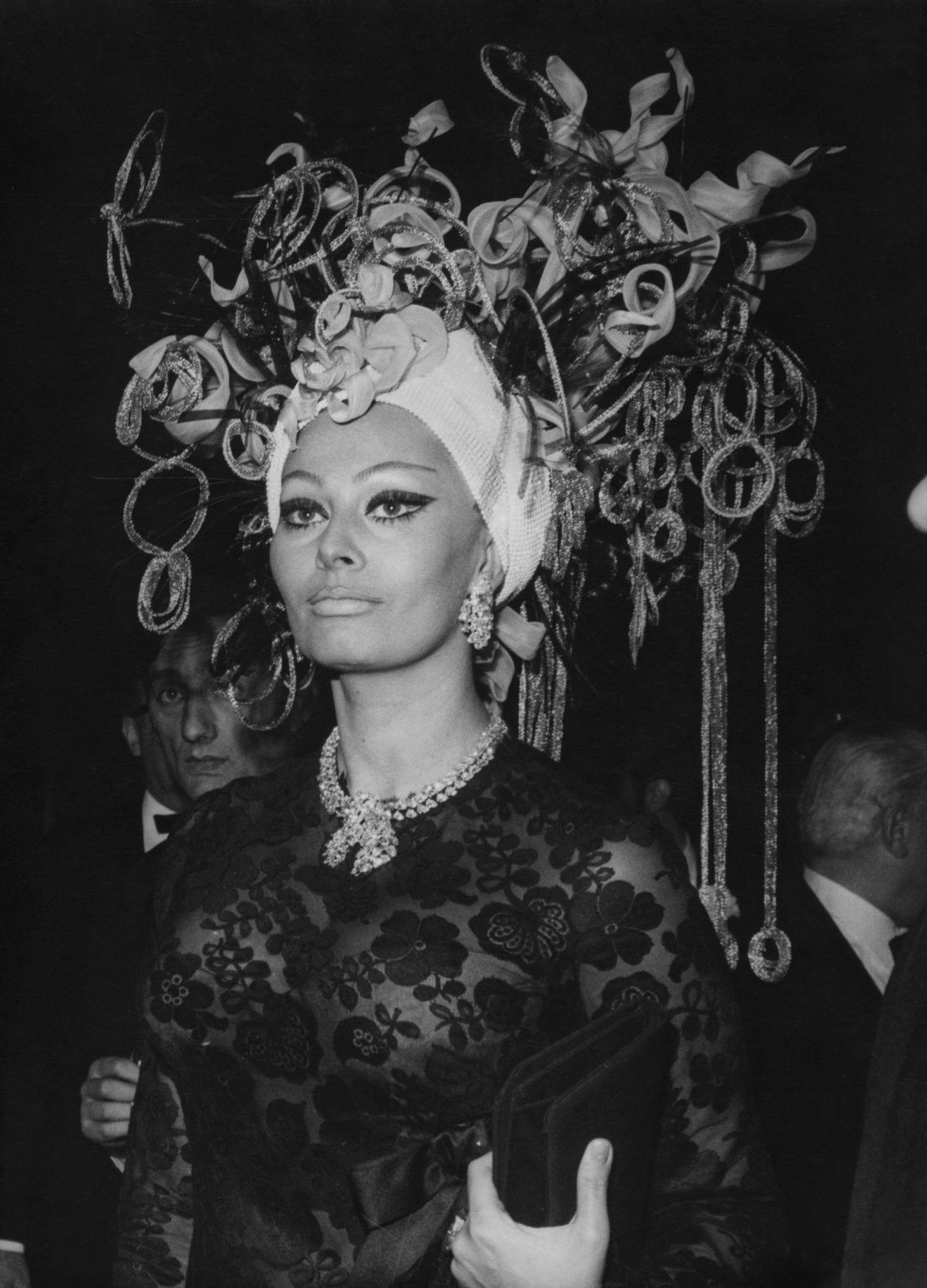 Sophia Loren arrives at a grand ball at the casino in