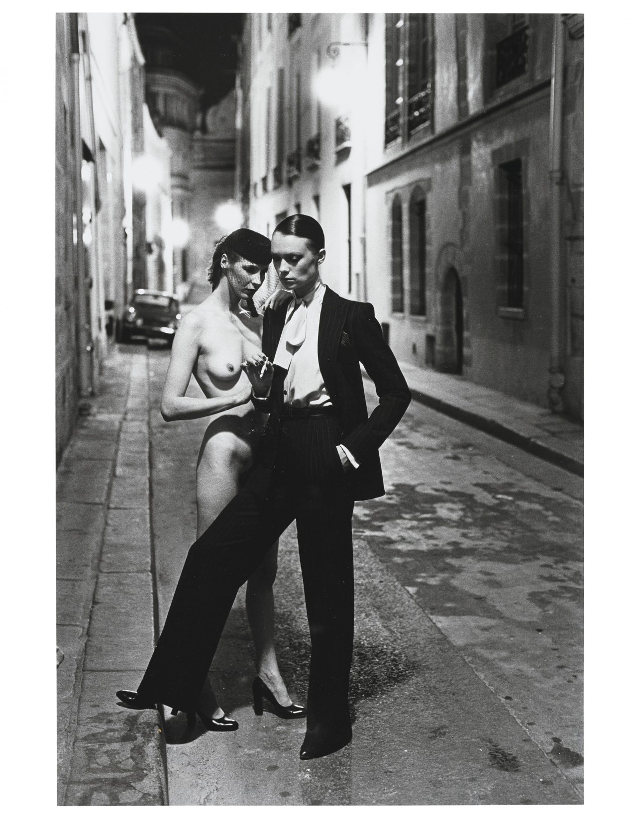 Helmut Newton (1920-2004), Yves St. Laurent, Rue Aubriot, French Vogue, Paris, 1975