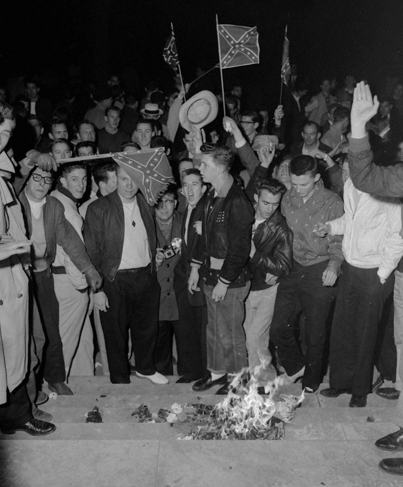 Students at the University of Alabama burn desegregation literature in Tuscaloosa, Alabama, on February 6, 1956, in response to the enrollment of Autherine Lucy. (Library of Congress/AP)