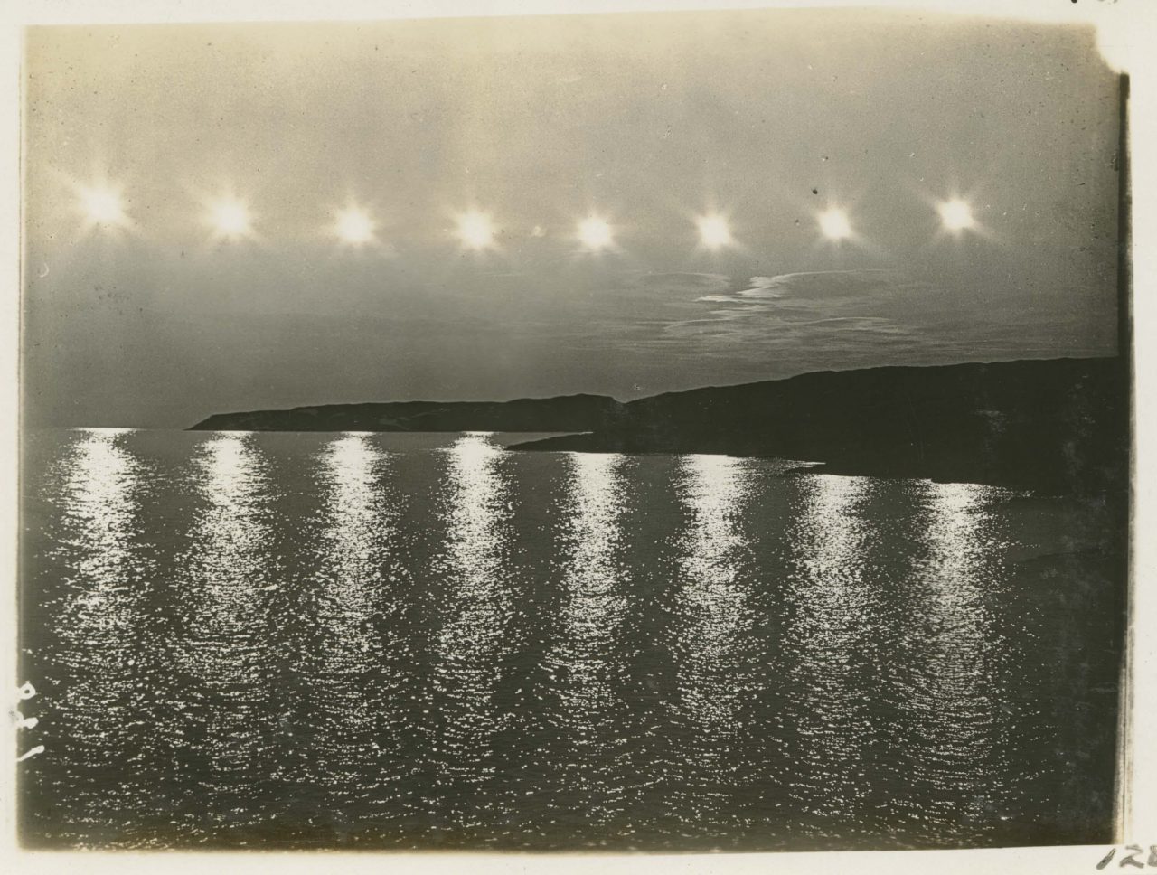 Eight exposures of midnight sun in Smith Sound from Sunrise Point begin 11pm 20th century Greenland Image July 25, 1917